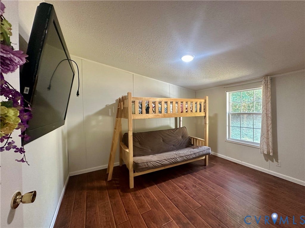 25400 SAYLERS CREEK ROAD, Deatonville, Jetersville, VA 23083 Room featuring wood-finish flooring, a single-pane window, and recessed ceiling lighting