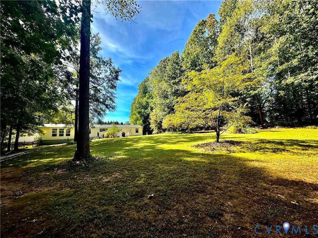 25400 SAYLERS CREEK ROAD, Deatonville, Jetersville, VA 23083 Expansive grounds featuring mature shade trees, established landscaping, and open green space
