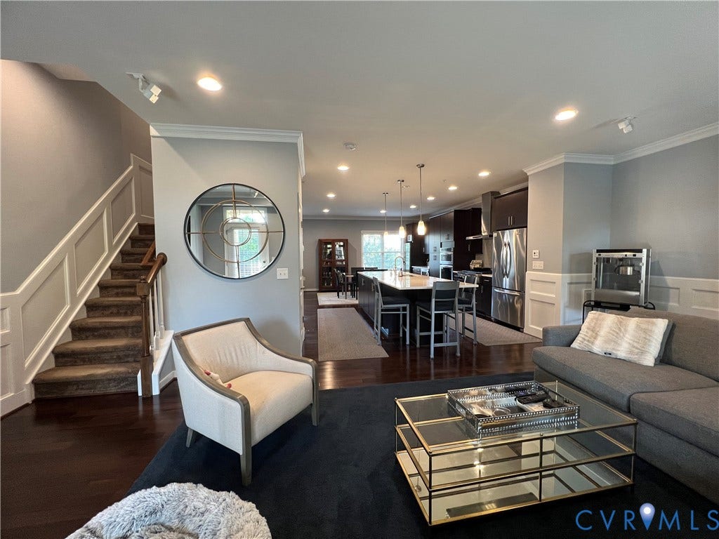 2310 Liesfeld Parkway, West Broad Village, Henrico, VA 23060 Open-concept interior featuring dark hardwood flooring, recessed lighting, and a kitchen island with stone countertops