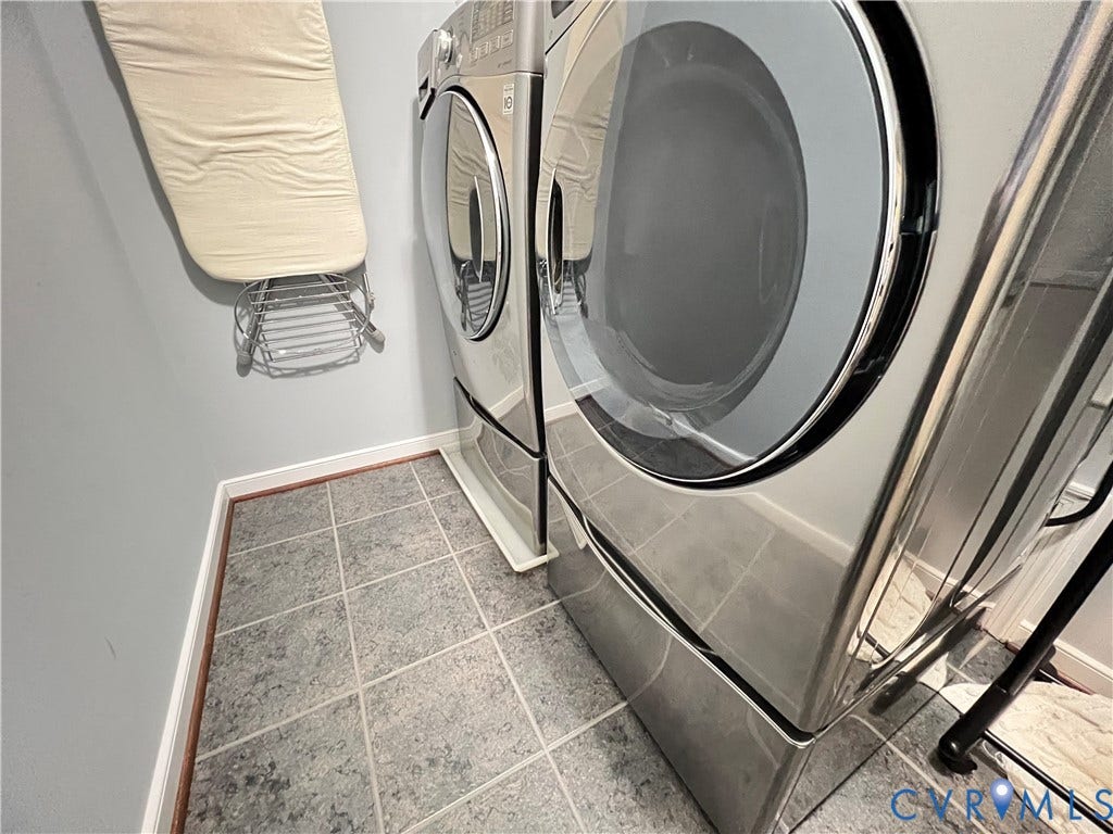 2310 Liesfeld Parkway, West Broad Village, Henrico, VA 23060 Utility space featuring large-format ceramic tile flooring and stainless steel front-load laundry appliances