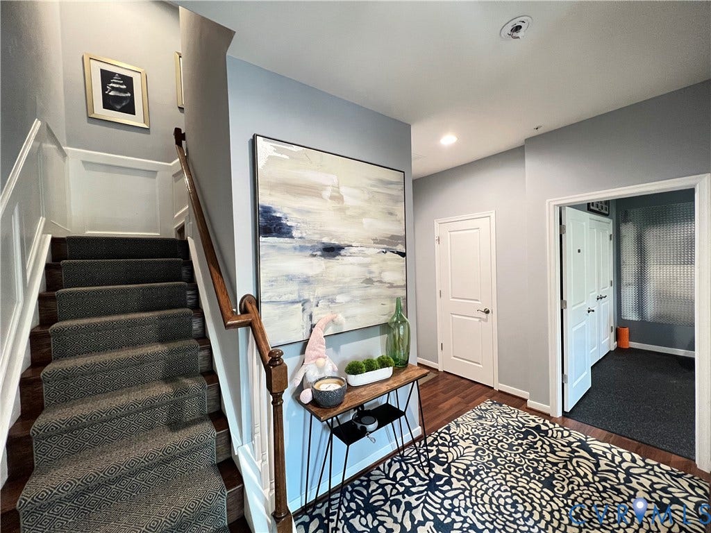 2310 Liesfeld Parkway, West Broad Village, Henrico, VA 23060 Foyer featuring wood-finish flooring, staircase with patterned carpeting, recessed lighting, and wall paneling