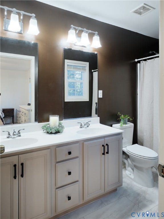 444 Tillar Lane, Mineral, VA 23117 Beautifully remodeled bathroom with dual vanitites.