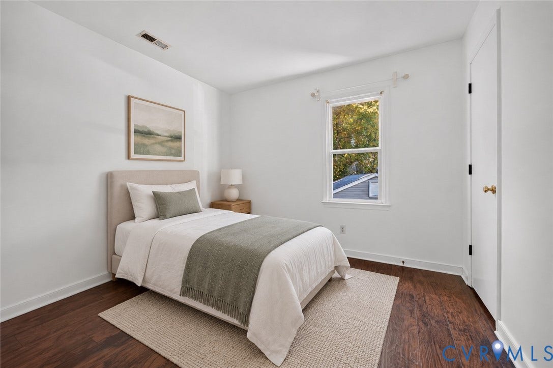 7225 Hartsdale Court, Chesterfield, VA 23832 Virtually staged Bedroom featuring wood-finish flooring, a double-hung window, and a white interior door with brass-toned hardware