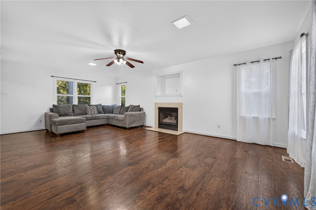 7225 Hartsdale Court, Chesterfield, VA 23832 Living area featuring wood-finish flooring, a fireplace with a neutral surround, recessed lighting, and a ceiling fan