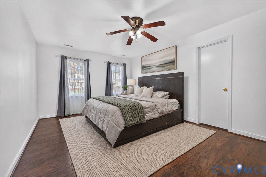 7225 Hartsdale Court, Chesterfield, VA 23832 Virtually Staged Wood-finish flooring, dual windows with decorative trim, and an integrated ceiling fan with multi-bulb light fixture