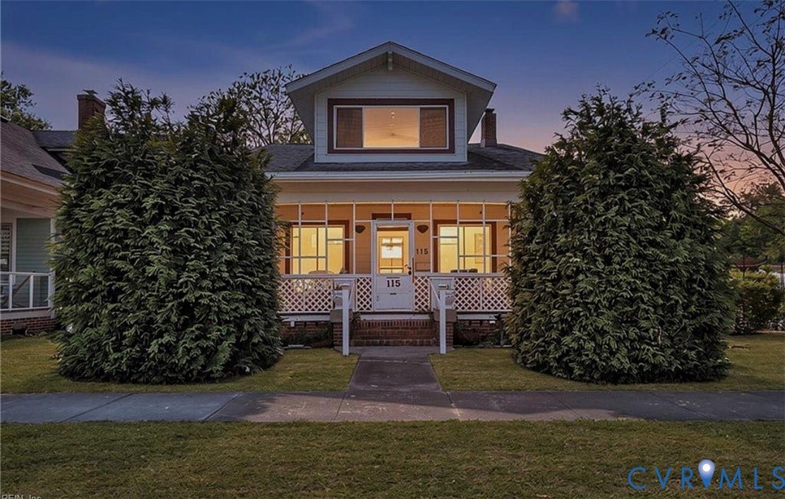 115 Katherine Street, Kings Borough, Suffolk, VA 23434 Craftsman-style exterior featuring a covered front porch, white lattice railing, gabled roofline, and brick stair risers