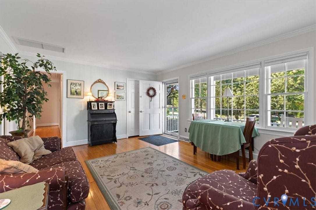 5111 Hurop Road, Sandston, VA 23150 Hardwood flooring, multi-pane windows, crown molding, and a six-panel exterior door