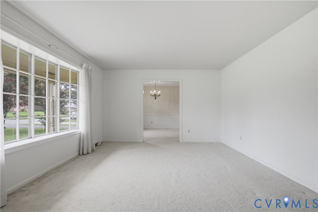3641 Kiefer Road, Bermuda, Chester, VA 23831 Large interior space featuring wall-to-wall carpeting, expansive multi-pane windows, and a wide cased opening