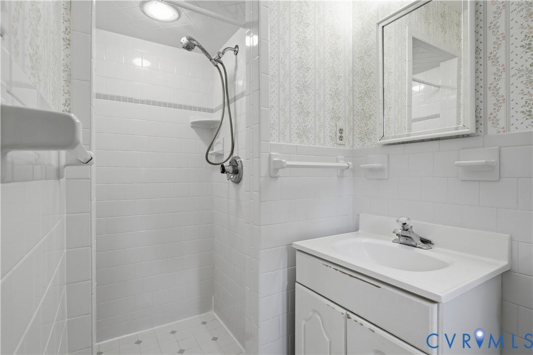 3641 Kiefer Road, Bermuda, Chester, VA 23831 Bathroom featuring a walk-in shower with white subway tile surround, recessed lighting, integrated vanity sink, and medicine cabinet with framed mirror