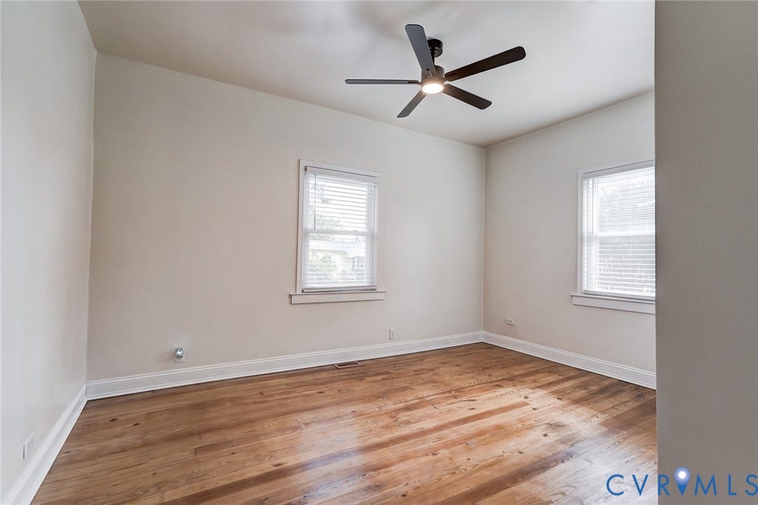 Master Bedroom with hardwood floors