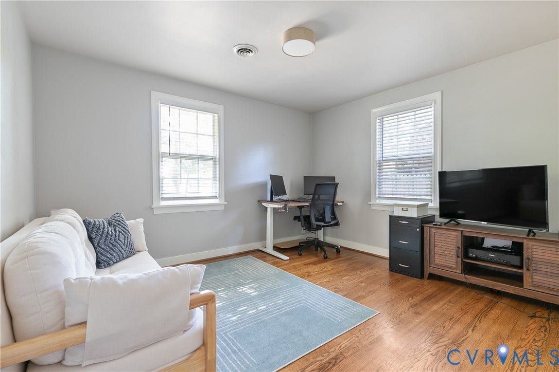 2108 Parkside Avenue, Henrico, VA 23228 Wood-finish flooring, two multi-pane windows, and a flush-mount drum ceiling light fixture