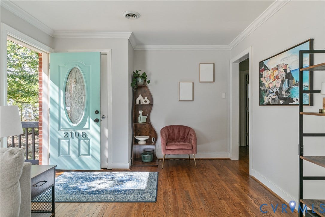 2108 Parkside Avenue, Henrico, VA 23228 Entryway featuring wood-finish flooring, crown molding, and an exterior door with a decorative oval glass insert