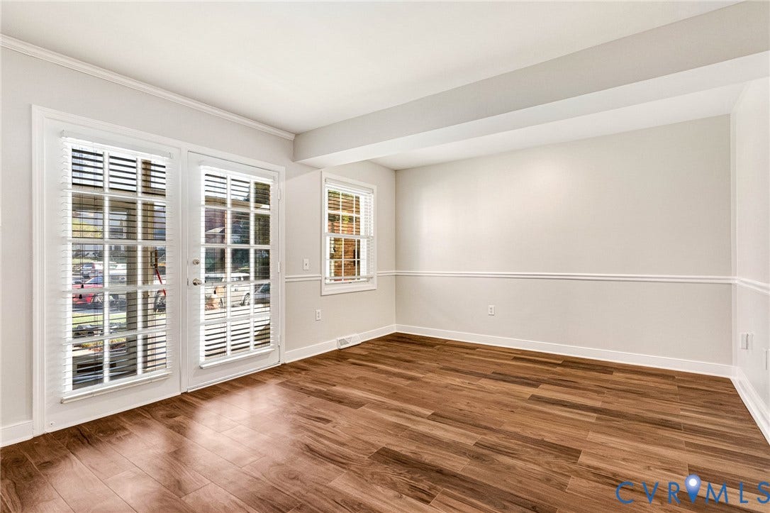 4 Millstone Road, The Hamlet, Henrico, VA 23228 Room featuring wood-finish flooring, white wall molding, glass-paned French doors, and a double-hung window
