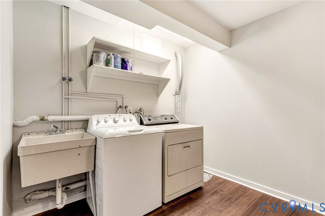 4 Millstone Road, The Hamlet, Henrico, VA 23228 Dedicated utility area featuring wood-finish flooring, a wall-mounted utility sink, and built-in upper shelving
