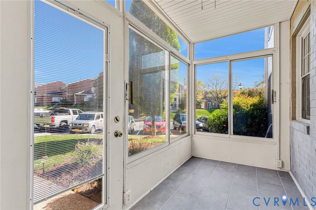 4 Millstone Road, The Hamlet, Henrico, VA 23228 Enclosed sunroom featuring expansive glass walls, a neutral tile floor, beadboard ceiling, and a glass-paneled entry door