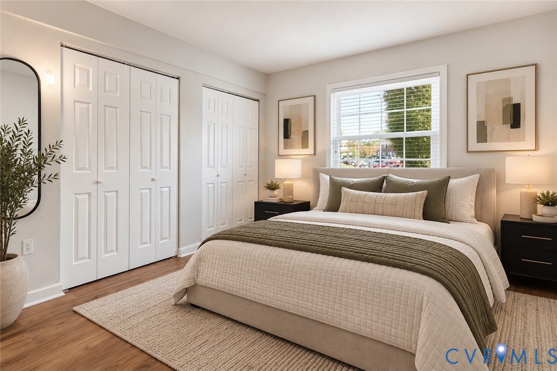 4 Millstone Road, The Hamlet, Henrico, VA 23228 Bedroom featuring wood-finish flooring, dual bi-fold closet doors, and a double-hung window with muntins