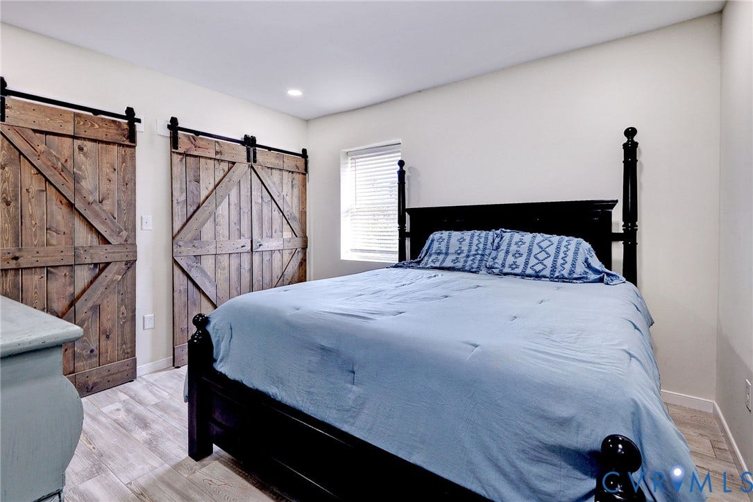 730 N 23RD Street, Union Hill, Richmond, VA 23223 Primary (king sized bed shown) with two deep closets and en suite.