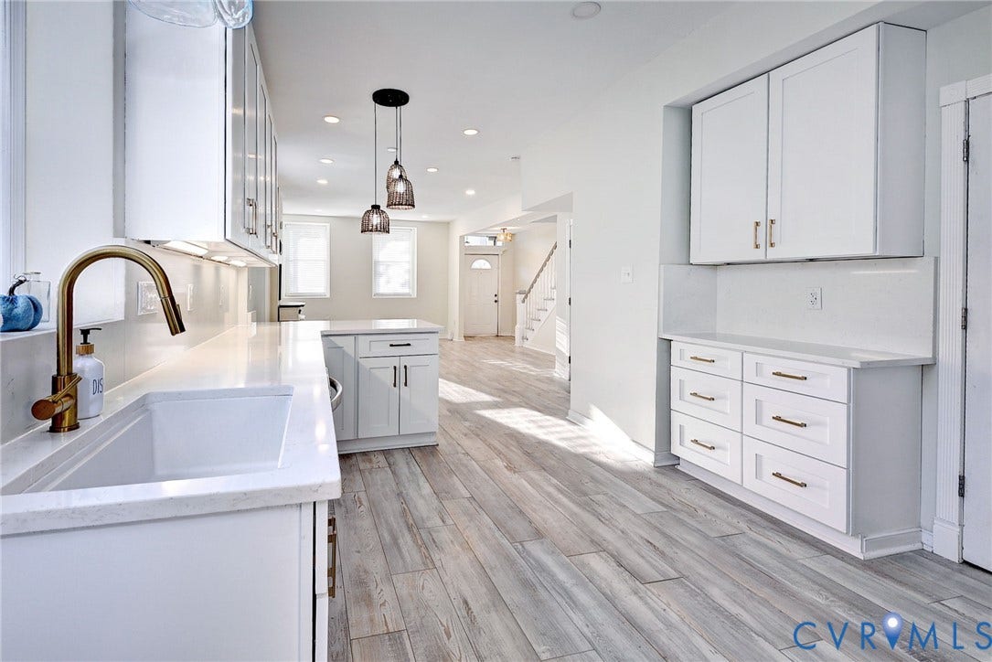 730 N 23RD Street, Union Hill, Richmond, VA 23223 Kitchen featuring shaker-style cabinetry, white countertops, a deep farmhouse-style sink with a brass-finish faucet