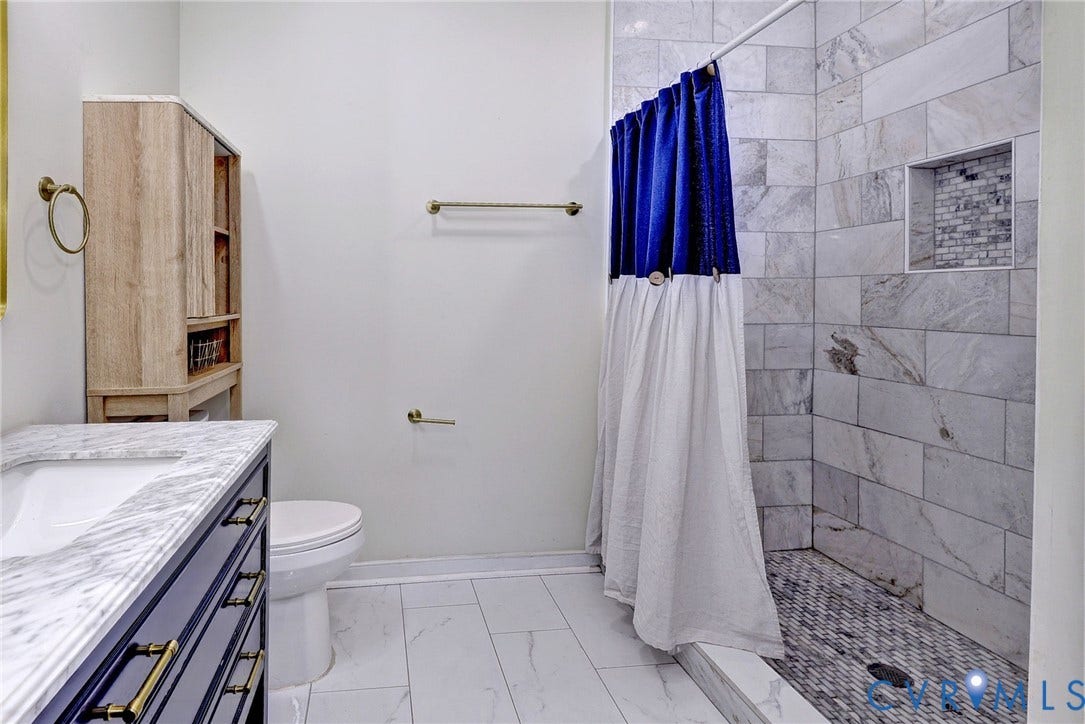 730 N 23RD Street, Union Hill, Richmond, VA 23223 En suite with tile and brass accents.