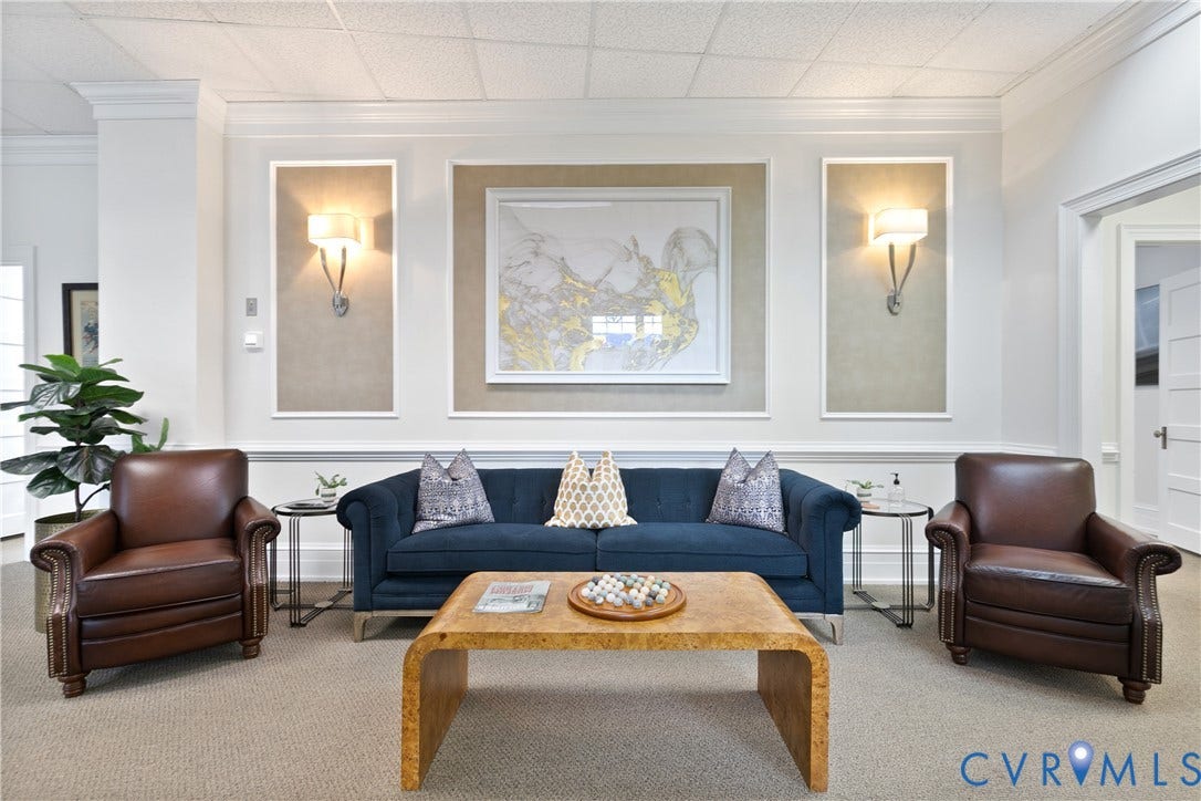 2800 Patterson Avenue, Richmond, VA 23221 Interior wall featuring recessed accent panels, crown molding, and dual wall-mounted light fixtures