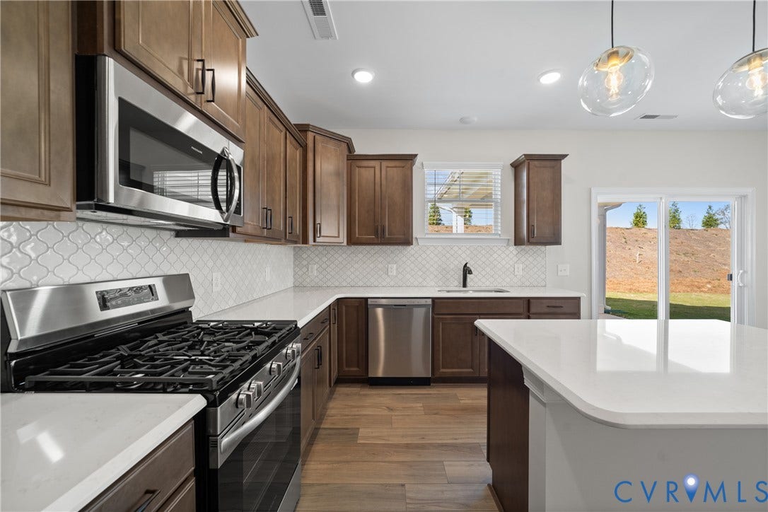 This home is UNDER CONSTRUCTION. The photo represents the plan, not the actual home. Design selections have been made.
