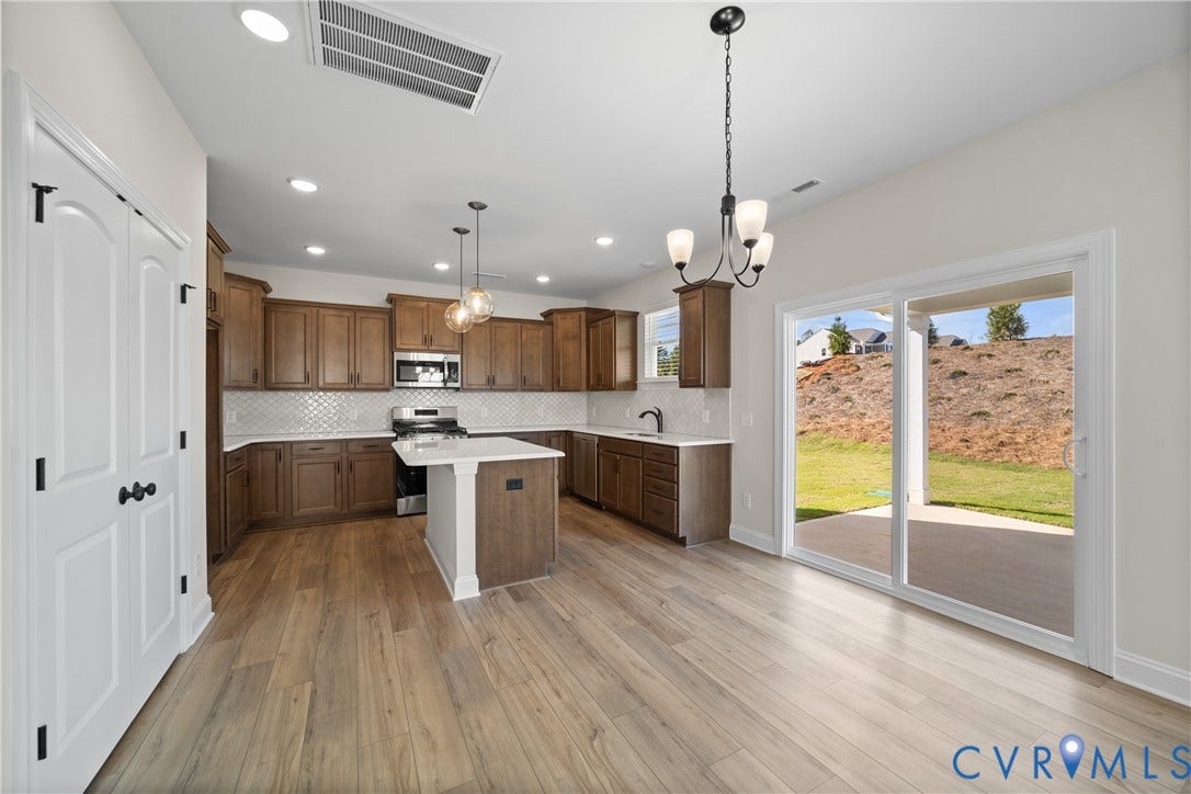 This home is UNDER CONSTRUCTION. The photo represents the plan, not the actual home. Design selections have been made.