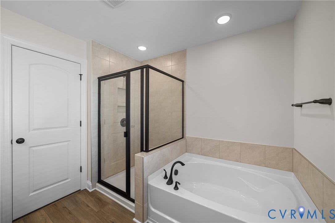 This home is UNDER CONSTRUCTION. The photo represents the plan, not the actual home. Design selections have been made.