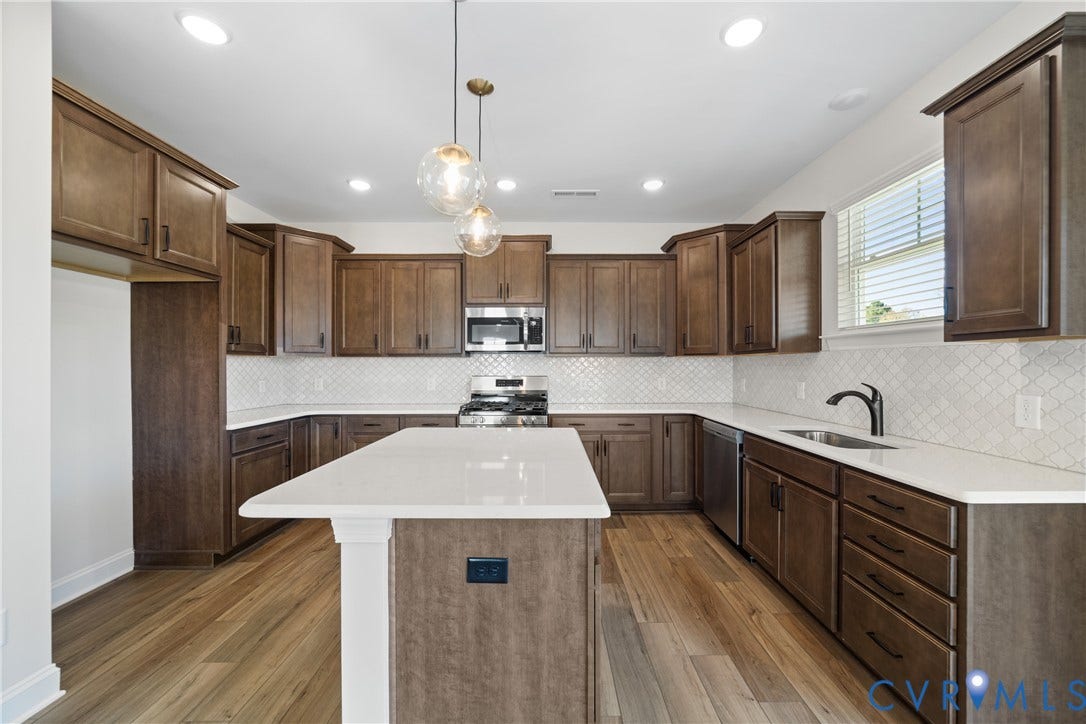 This home is UNDER CONSTRUCTION. The photo represents the plan, not the actual home. Design selections have been made.