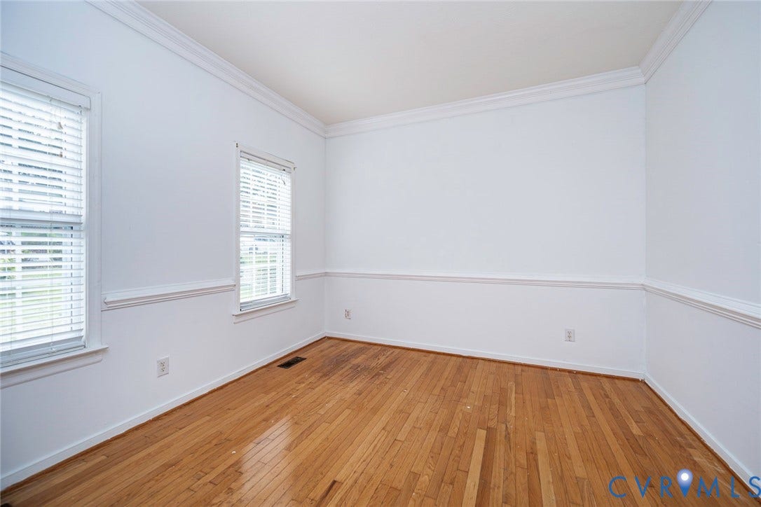 2408 Swartwout Avenue, Woodland Hills, Henrico, VA 23228 Room featuring wood-finish flooring, crown molding, chair rail trim, and dual windows with integrated blinds