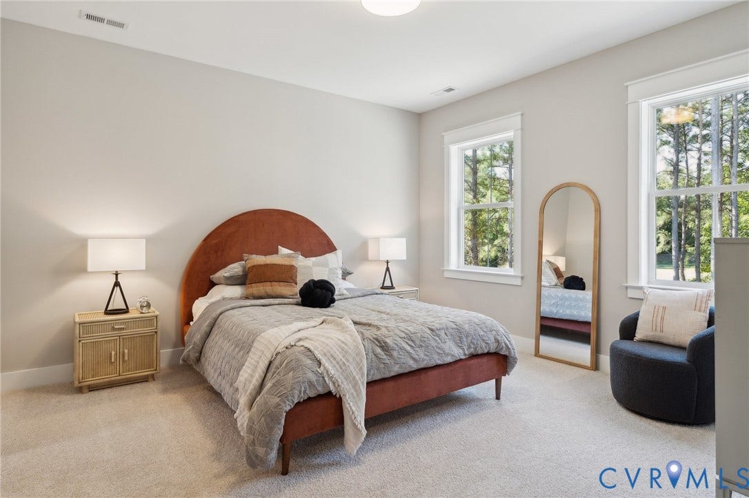 18128 Dogwood Trail Way, Rockville, VA 23146 Neutral wall-to-wall carpeting, dual double-hung windows with white trim, and light-toned wall paint