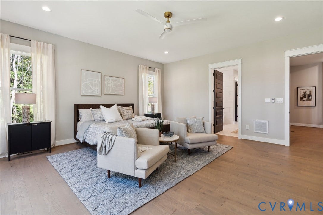 18128 Dogwood Trail Way, Rockville, VA 23146 Open-concept room featuring wood-finish flooring, recessed lighting, a modern ceiling fan, and multipane windows