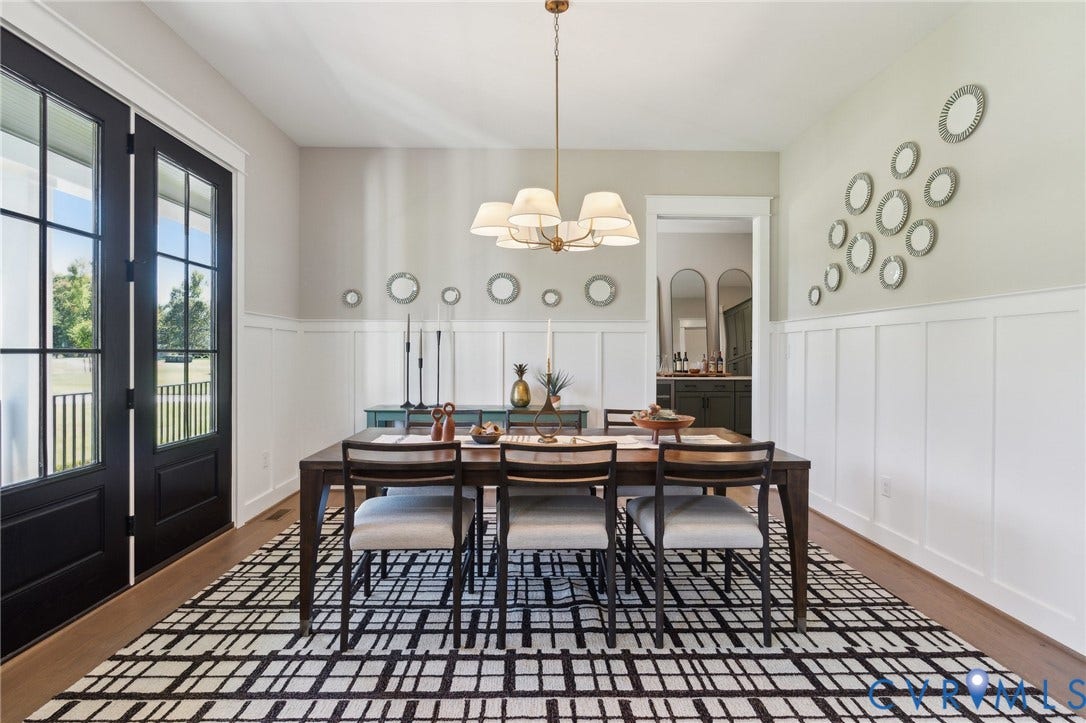 18128 Dogwood Trail Way, Rockville, VA 23146 Dining area featuring board and batten wainscoting, wood-finish flooring, a multi-light chandelier, and black-framed French doors