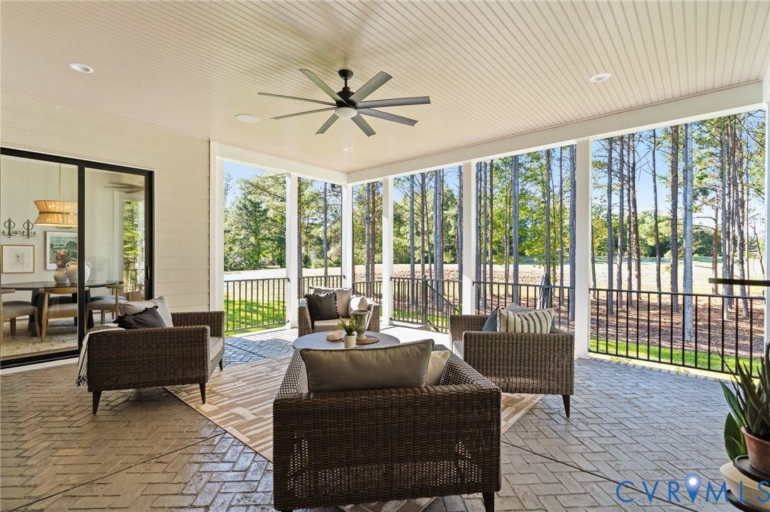 18128 Dogwood Trail Way, Rockville, VA 23146 Covered porch featuring herringbone-patterned brick flooring, beadboard ceiling, recessed lighting, ceiling fan, and black metal railing