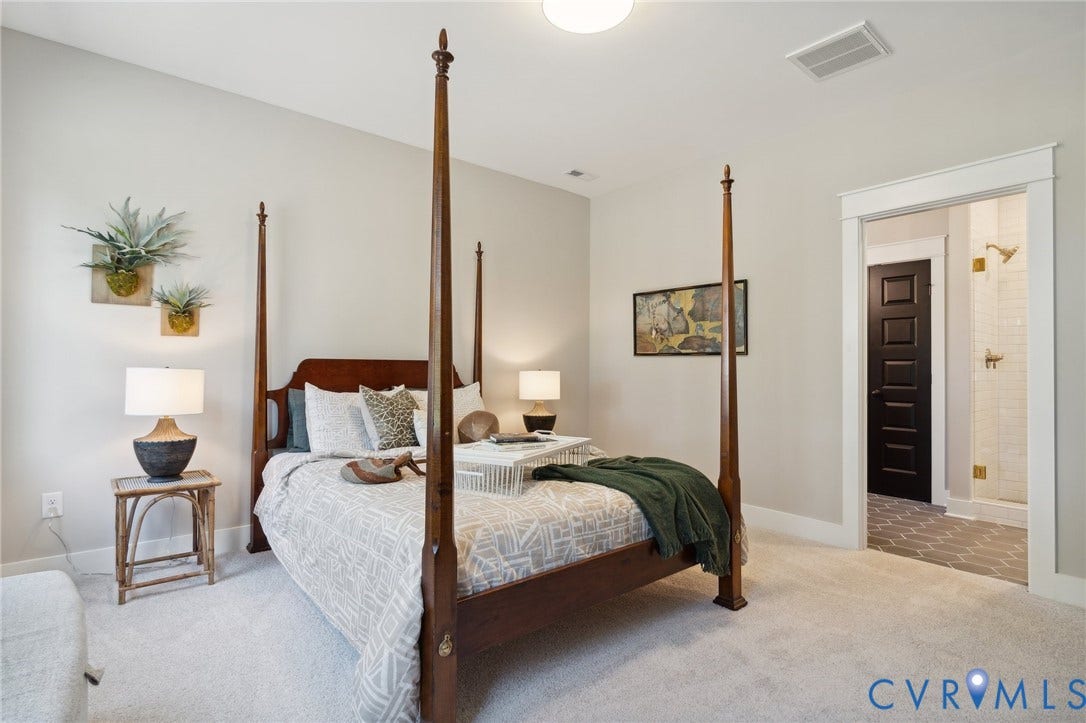 18128 Dogwood Trail Way, Rockville, VA 23146 Neutral wall tones, wall-to-wall carpeting, heavy-profile door casing, and a contrasting interior door
