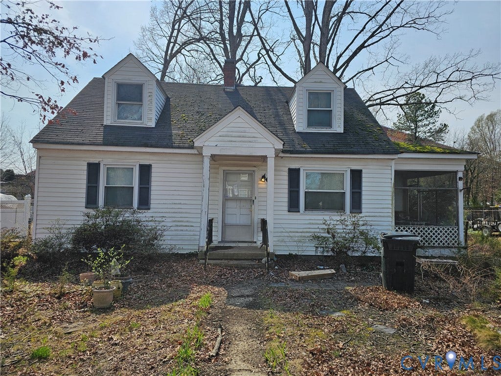 3455 McGuire Drive, McGuire Homes, Richmond, VA 23224 Cape Cod-style residence featuring white siding, dual roof dormers, a front porch entry with a gabled roofline, and an integrated side screen porch with lattice detailing