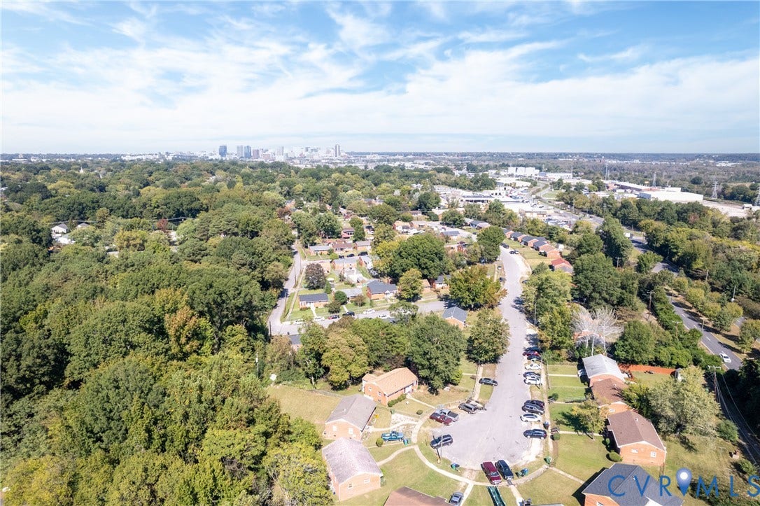 2108 Ridgemont Road, Richmond, VA 23224 Aerial perspective featuring mature trees, established residential landscape, and a skyline horizon