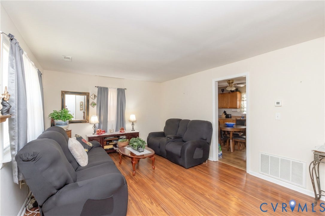 2108 Ridgemont Road, Richmond, VA 23224 Living area featuring wood-finish flooring and neutral wall tones