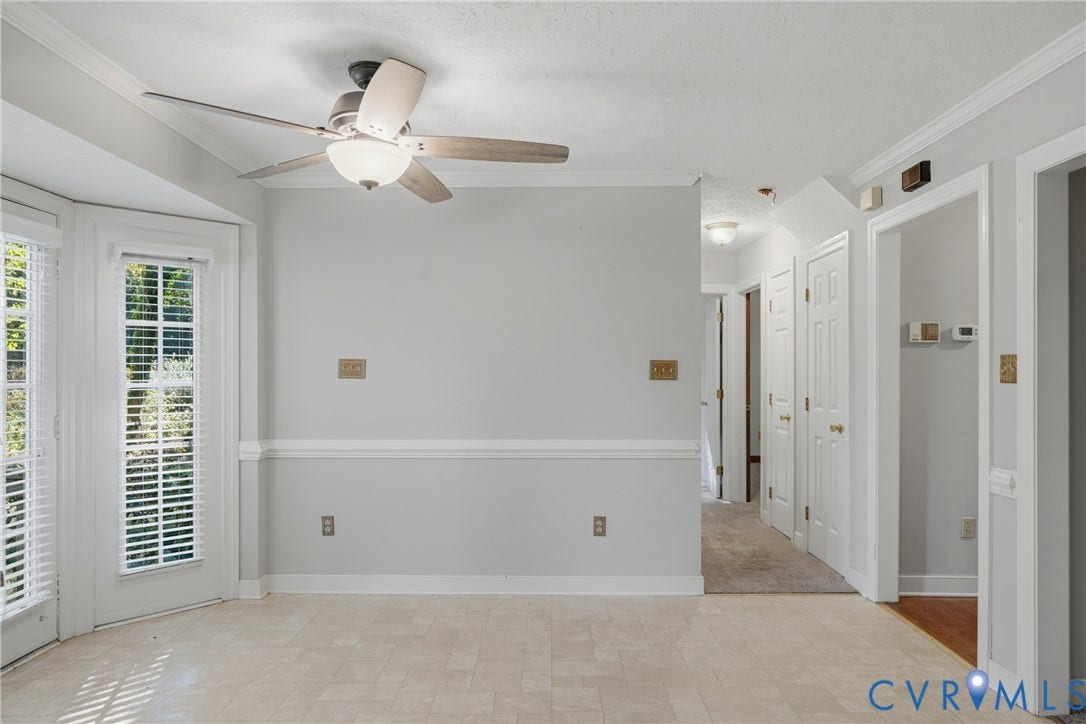 7270 Crossing Oaks Trail, Mechanicsville, VA 23111 Ceramic tile flooring, crown molding, chair rail trim, ceiling fan with light fixture, and dual-pane glass entry doors