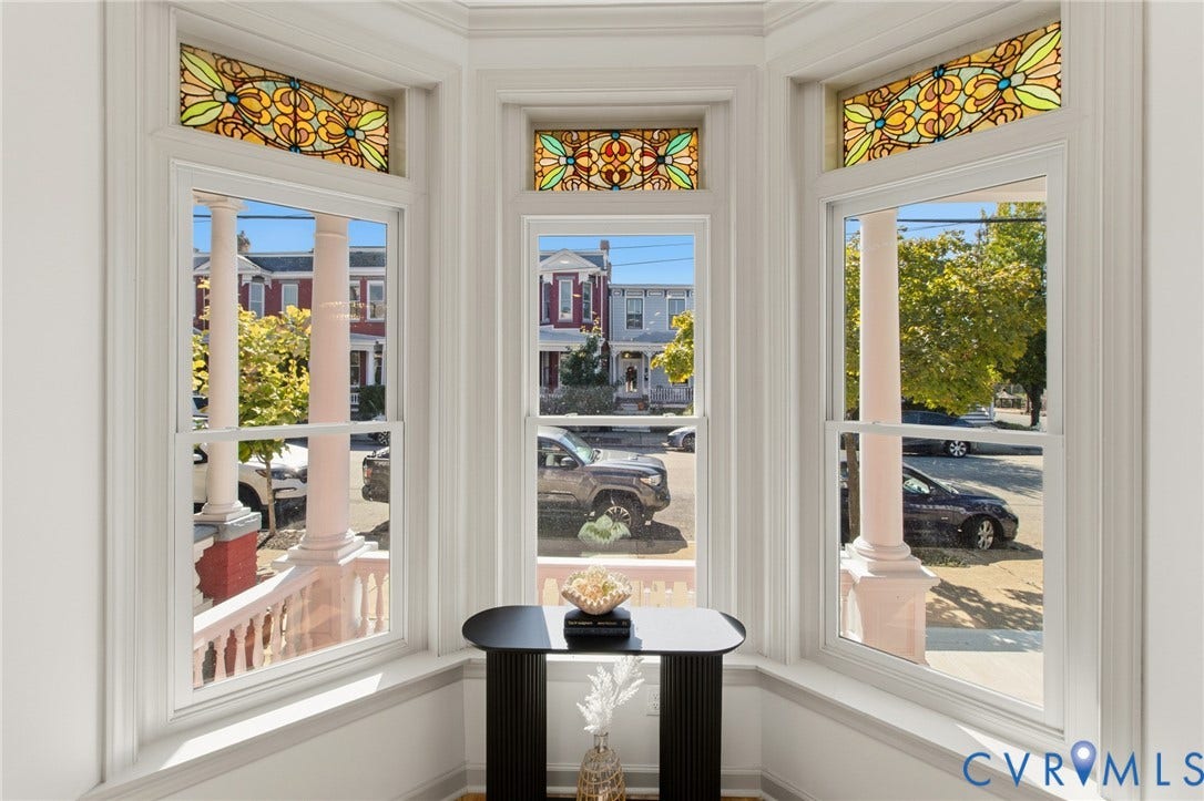 3104 E Broad Street, Richmond, VA 23223 Bay window featuring decorative stained glass transoms and detailed millwork trim