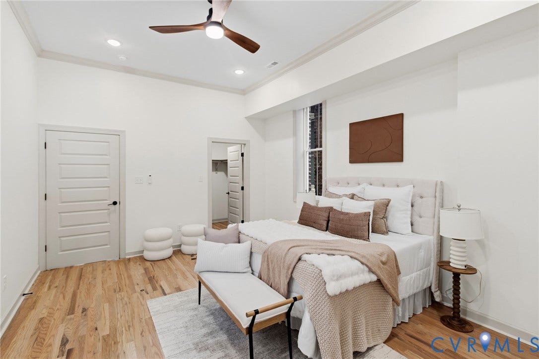 3104 E Broad Street, Richmond, VA 23223 High ceilings with crown molding, recessed lighting, wood-finish flooring, and a ceiling fan with integrated lighting