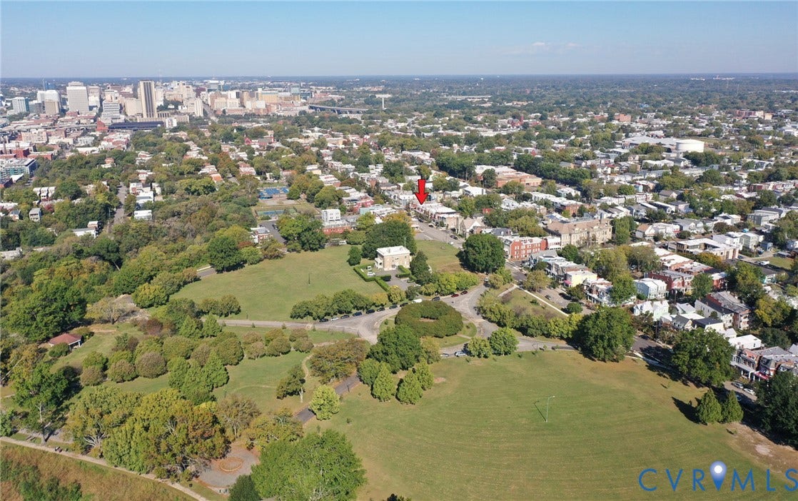 3104 E Broad Street, Richmond, VA 23223 Aerial perspective highlighting proximity to urban centers, expansive public green spaces, mature tree canopy, and established neighborhood infrastructure