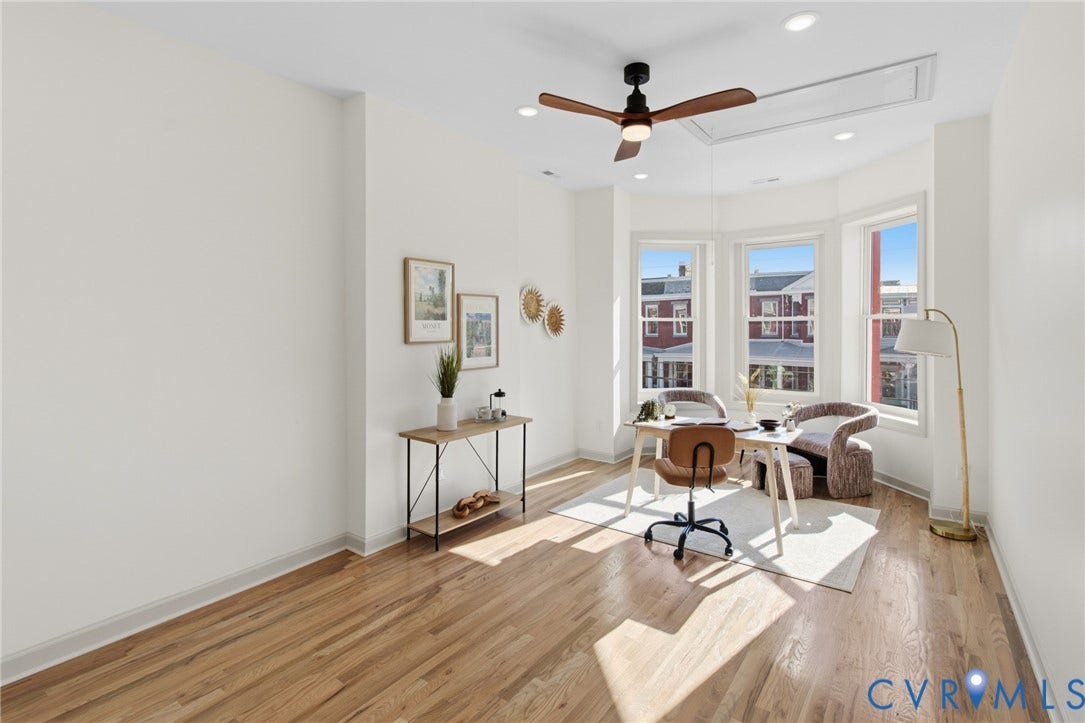3104 E Broad Street, Richmond, VA 23223 Living space featuring wood-finish flooring, a bay window configuration, recessed lighting, and a ceiling fan with integrated lighting