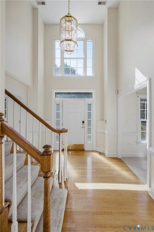 11400 County Drive, Prince George, VA 23842 Double-height entryway featuring hardwood flooring