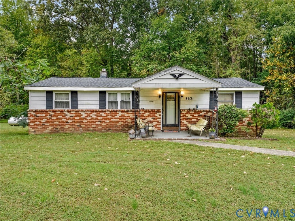 8631 Kimages Road, Charles City, VA 23030 Single-story exterior featuring a partial brick facade, horizontal siding, a covered front porch, and an asphalt shingle roof