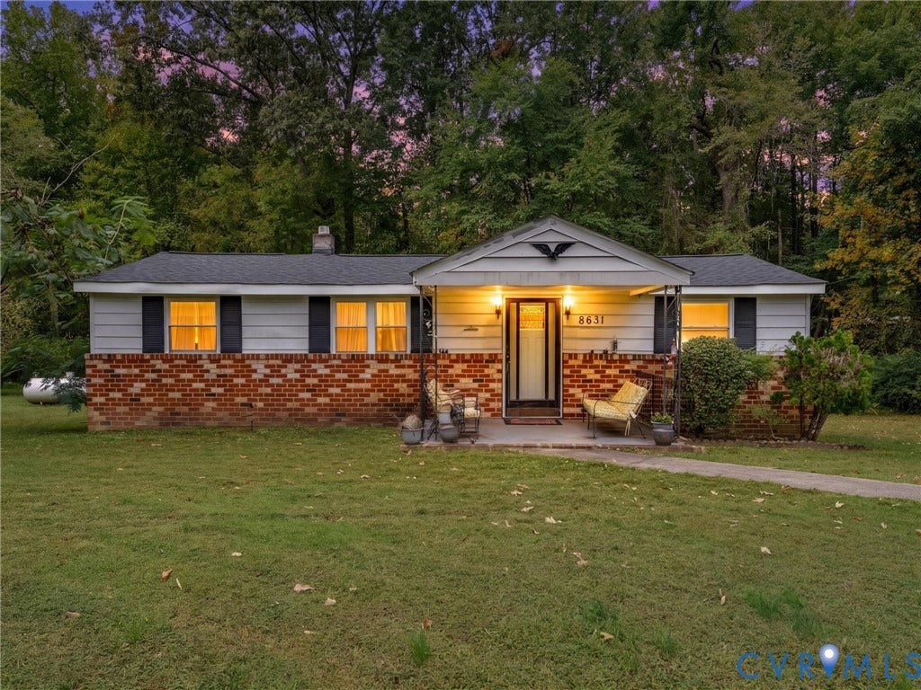 8631 Kimages Road, Charles City, VA 23030 Single-story residence featuring a partial brick exterior, horizontal siding, a covered front porch, and a shingled gable roof