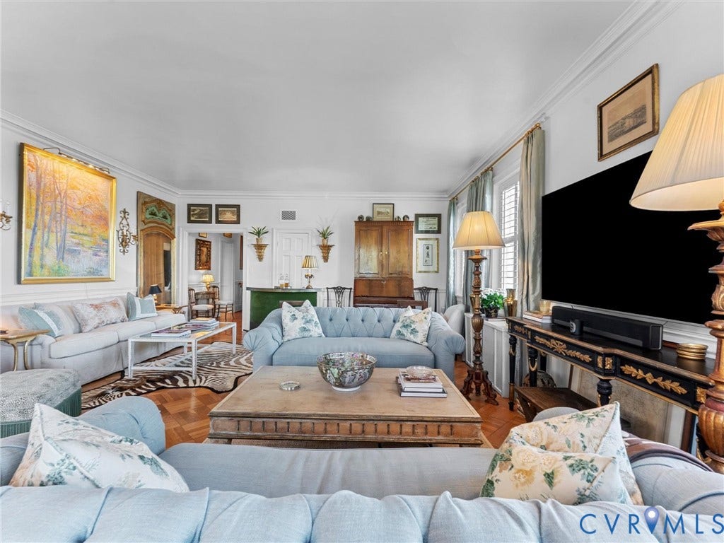 5621 Cary Street Road, #U506, Richmond, VA 23226 Living area featuring intricate parquet wood flooring, crown molding, and wainscoting