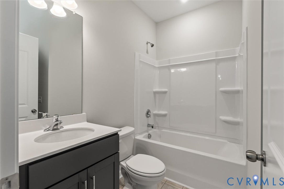 5048 Lorkimwood Road, Lawson Mill, Chesterfield, VA 23832 First Floor Guest Suite bath. This home is TO BE BUILT. The photo represents the plan, not the actual home. Design selections may vary.