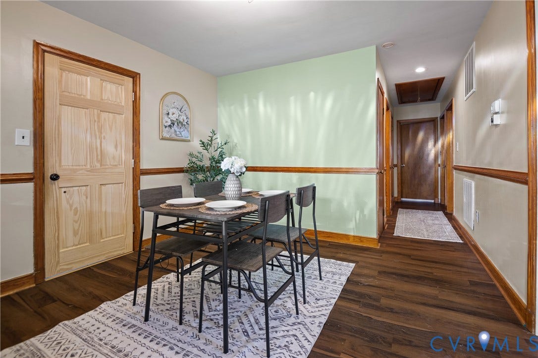 9834 N Wagstaff Circle, Mechanicsville, VA 23236 Interior space featuring wood-finish flooring, wood-panel doors, decorative chair rail molding, and a recessed ceiling lighting fixture