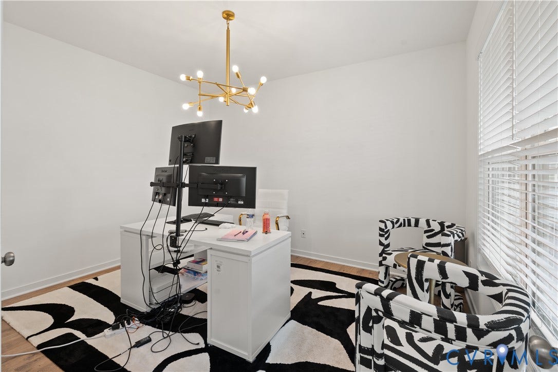 13807 Denleigh Court, Midlothian, VA 23112 Gold-finish sputnik chandelier, horizontal slat blinds, and wood-finish flooring