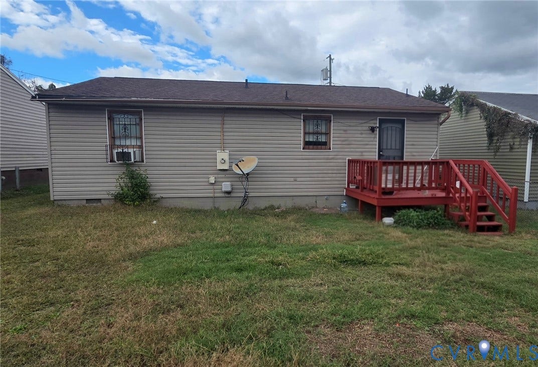 1342 Steel Street, Petersburg, VA 23803 Exterior siding, shingled roof, and elevated wood-frame deck with railing
